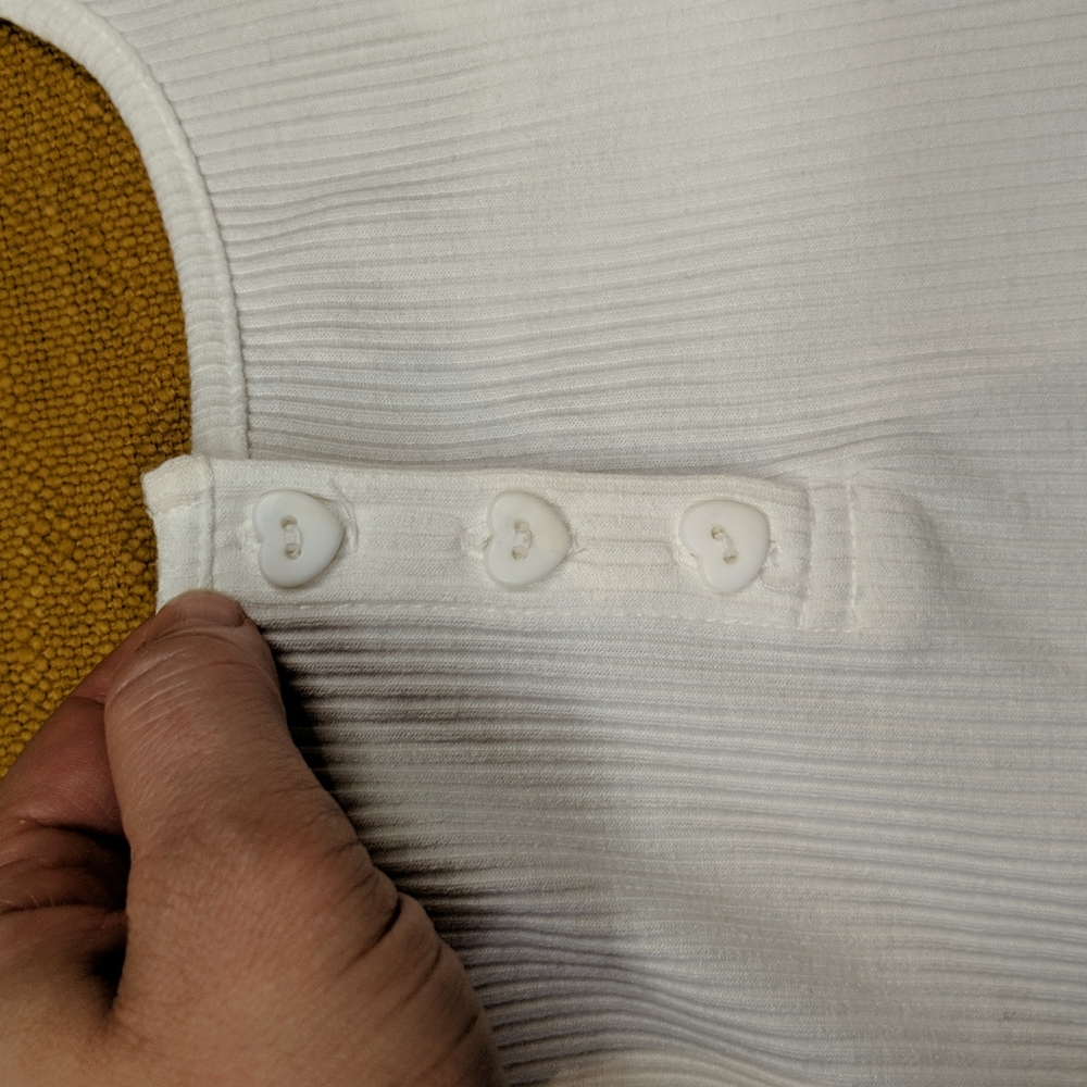 White crop tank with heart buttons ribbed